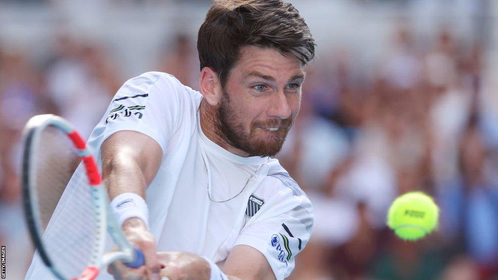 Cameron Norrie hits a return during his Australian Open win over Casper Ruud