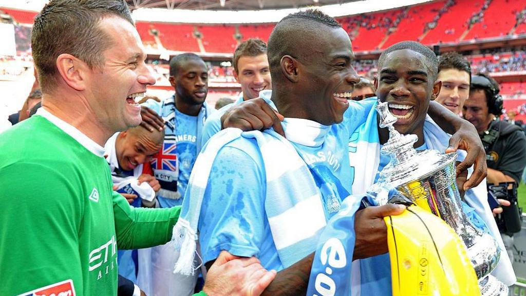 Mario Balotelli with the FA Cup