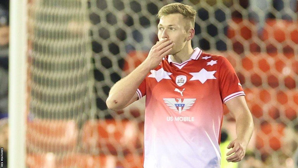 Sam Cosgrove celebrating his winner for Barnsley against Wycombe