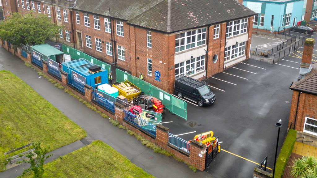 Workmen at Abbey Lane Primary School in Sheffield, on 1 September 2023
