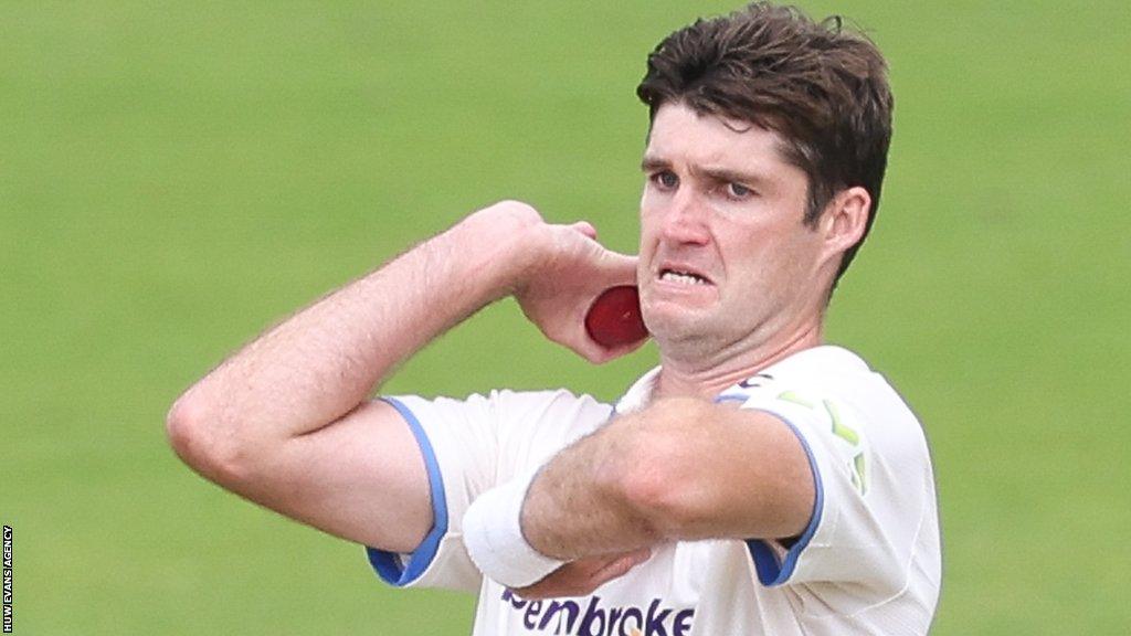 Henry Shipley bowls for Sussex earlier in the match
