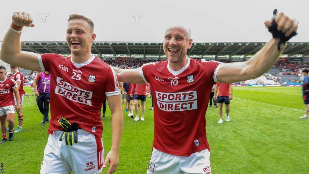 Steven Sherlock and Brian O'Driscoll celebrate Cork's one-point win over Roscommon