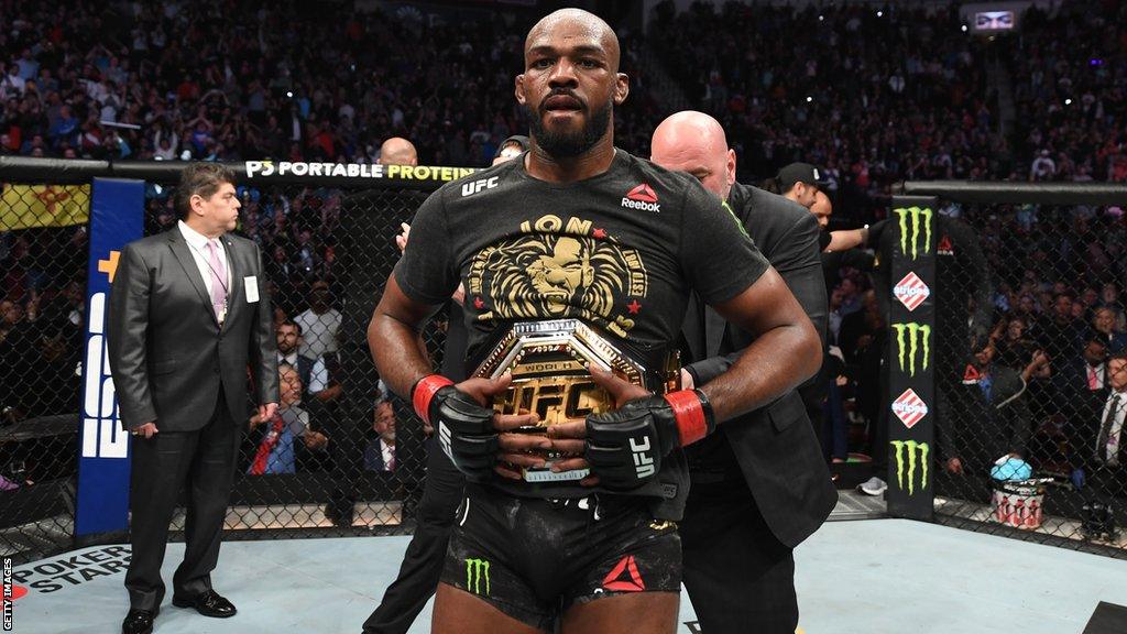 Jon Jones celebrates his victory over Dominick Reyes in 2020