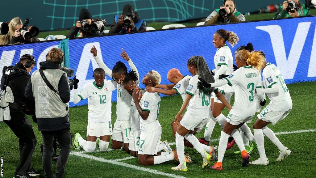 Zambia players celebrate scoring against Costa Rica