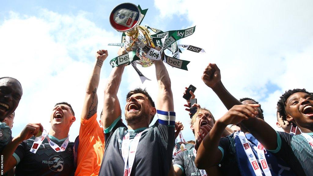 Plymouth Argyle lift the League One trophy