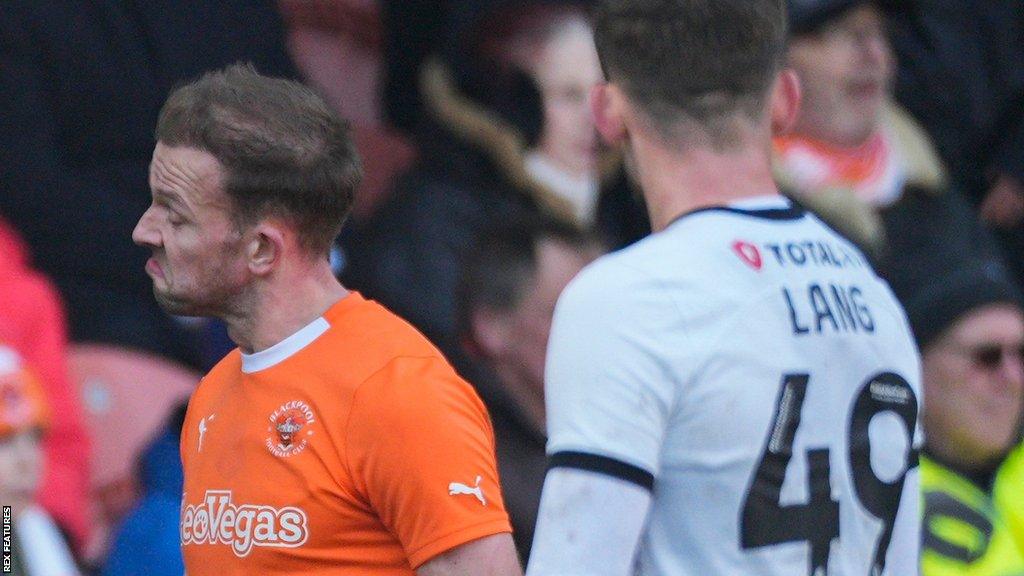 Jordan Rhodes heads fot the dressing room after being sent off