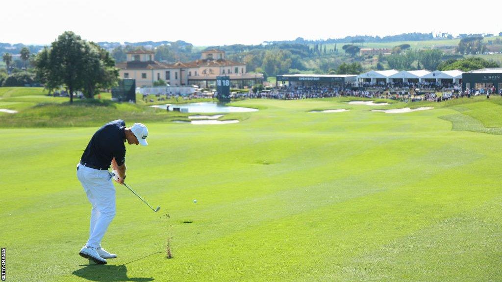 Adrian Meronk hitting his second shot on the 18th hole at Marco Simone Golf and Country Club