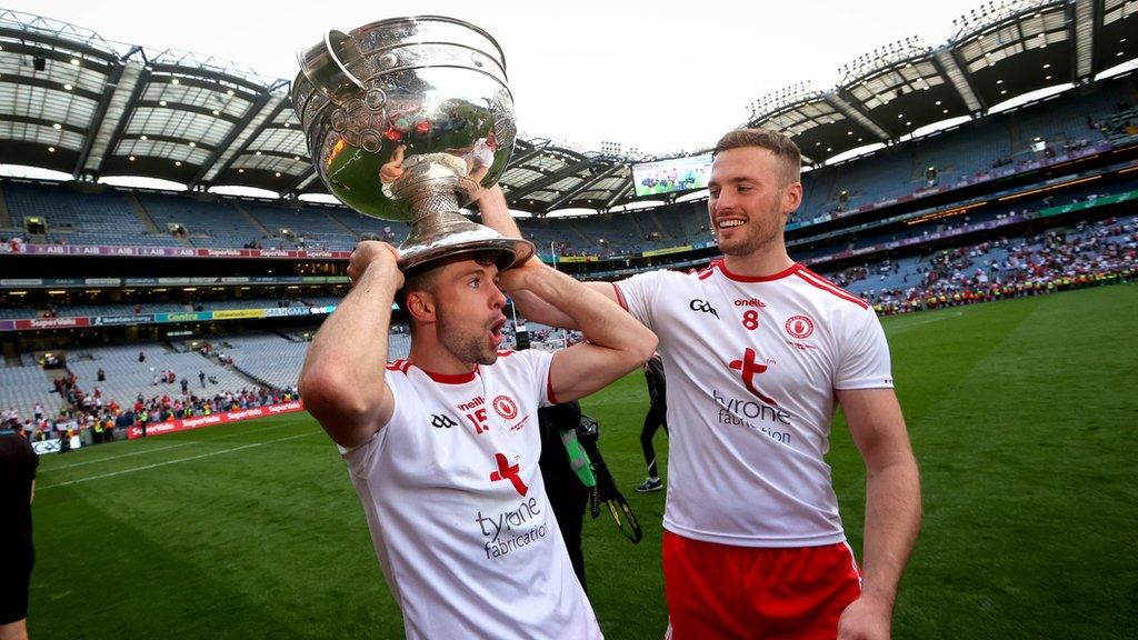 Tyrone's Conor McKenna and Brian Kennedy celebrate with the Sam Maguire trophy