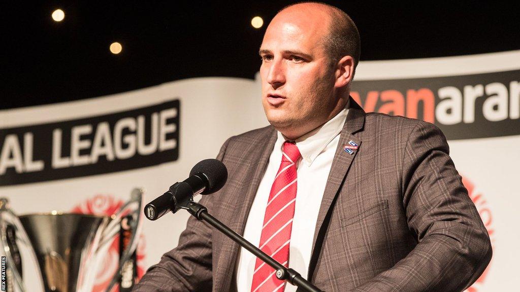 Danny Macklin speaking at a National League event