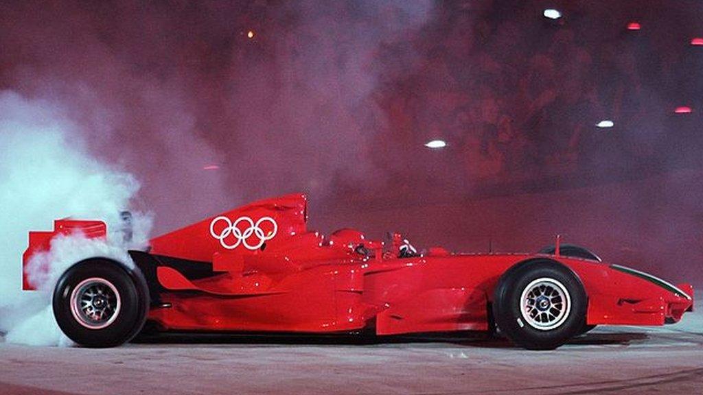 F1 car with the Olympic rings