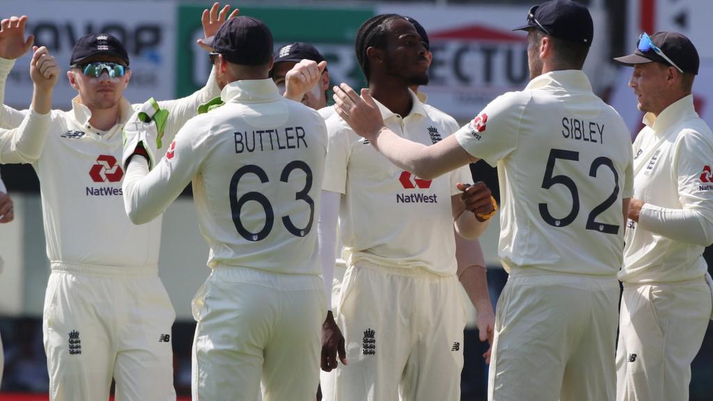 England celebrate a wicket