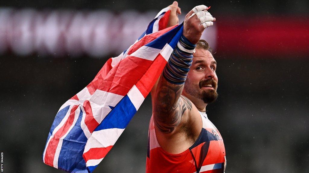 Aled Davies celebrates his gold medal in Tokyo