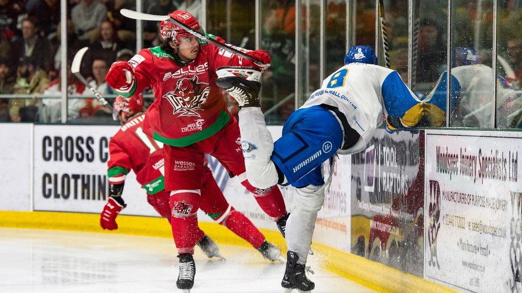 Chad Pietroniro hits a Fife player into the boards