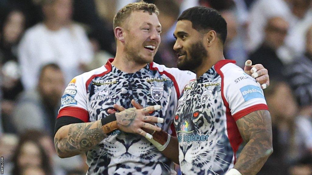 Josh Charnley (left) and Ricky Leutele celebrate for Leigh