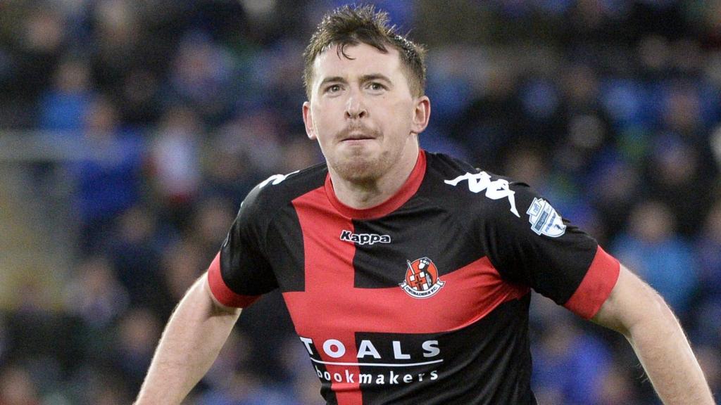 Billy Joe Burns celebrates his Crusaders equaliser at Windsor Park