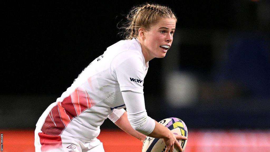 England scrum-half Ella Wyrwas prepares to pass the ball