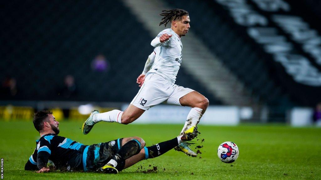 Tennai Watson in action for MK Dons against Forest Green at the Marshall Stadium in League One