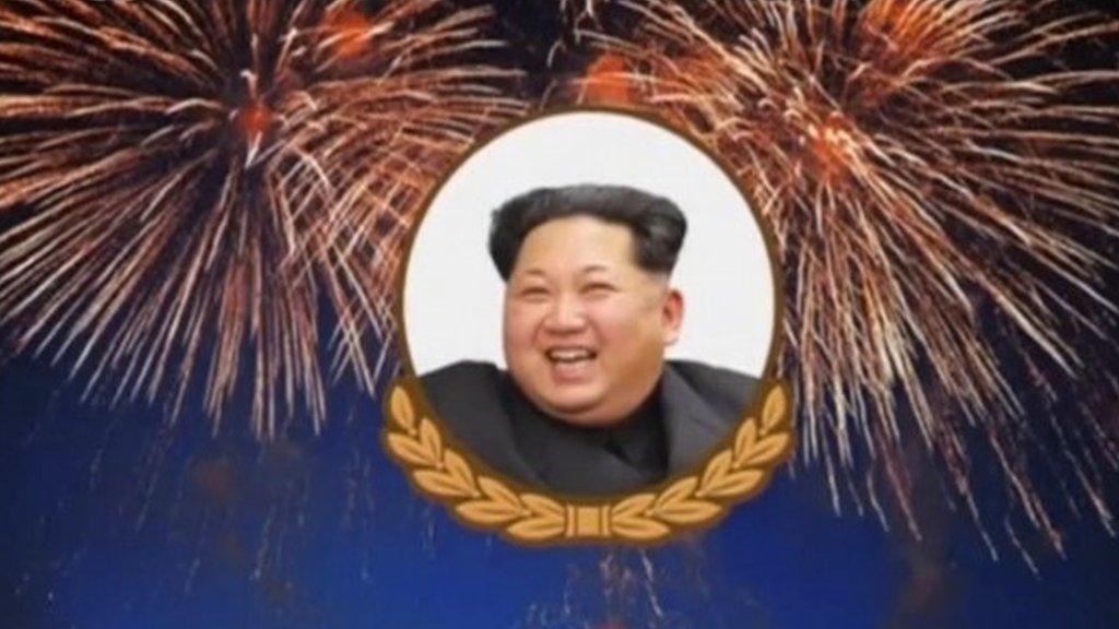 Image of leader Kim Jong-un over celebratory fireworks.