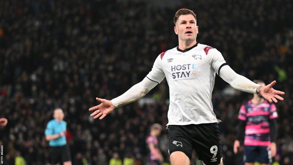 Derby's James Collins celebrates scoring a goal