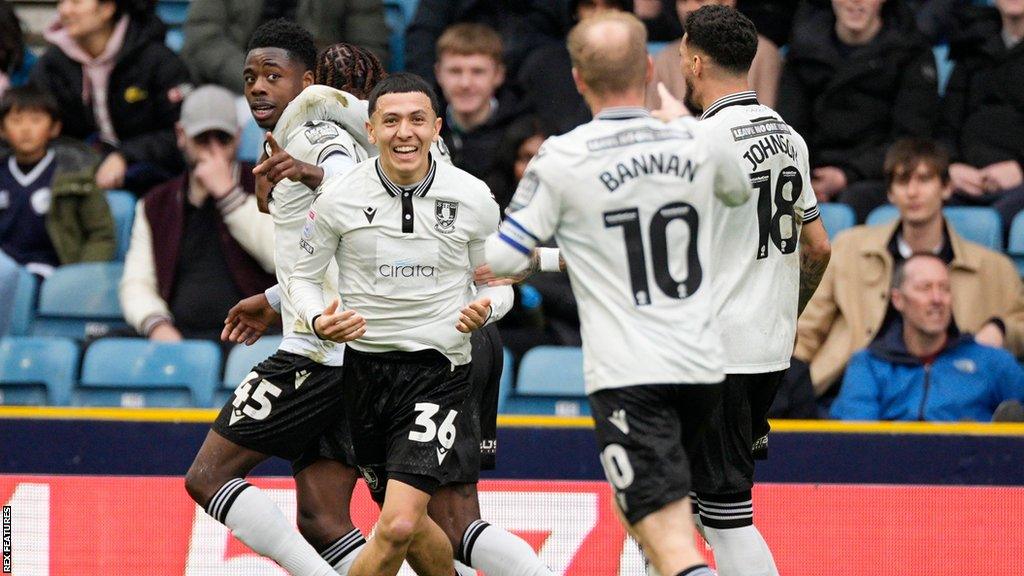 Sheffield Wednesday's players celebrate their second goal against Millwall