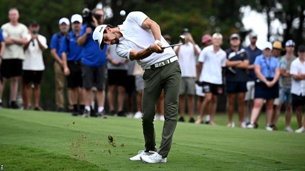 Joaquin Niemann plays a shot during the play-off at the Australian Open