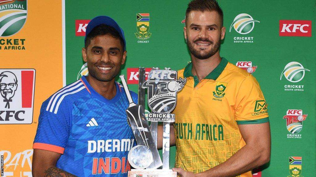 India captain Suryakumar Yadav and South Africa skipper Aidan Markram with the T20 series trophy