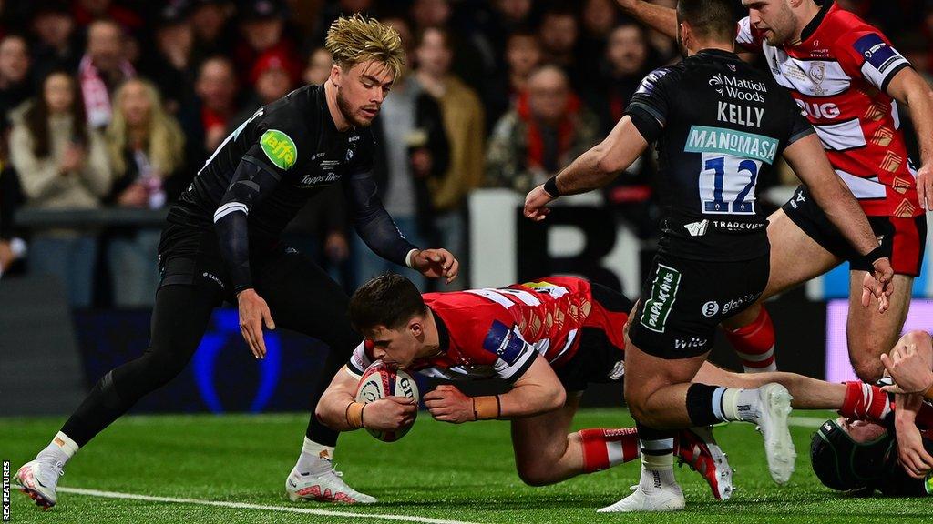 Seb Atkinson scores a try for Gloucester in the Premiership Rugby Cup final