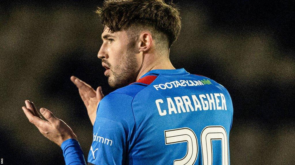 Inverness defender James Carragher claps his hands