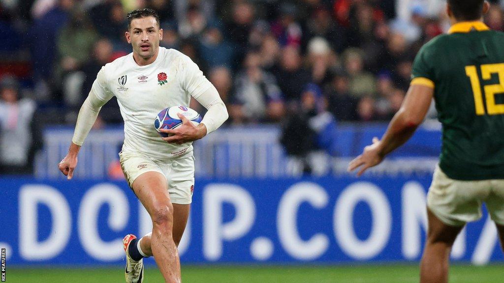 Jonny May runs with the ball during England's World Cup semi-final match against South Africa