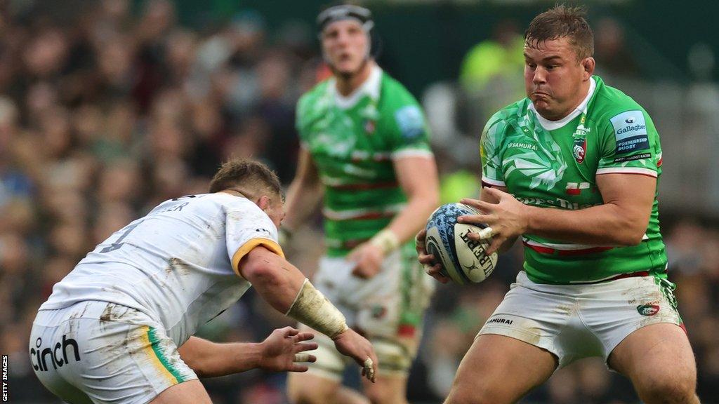 Leicester's Charlie Clare tries to evade a tackle in Tigers' win against Northampton