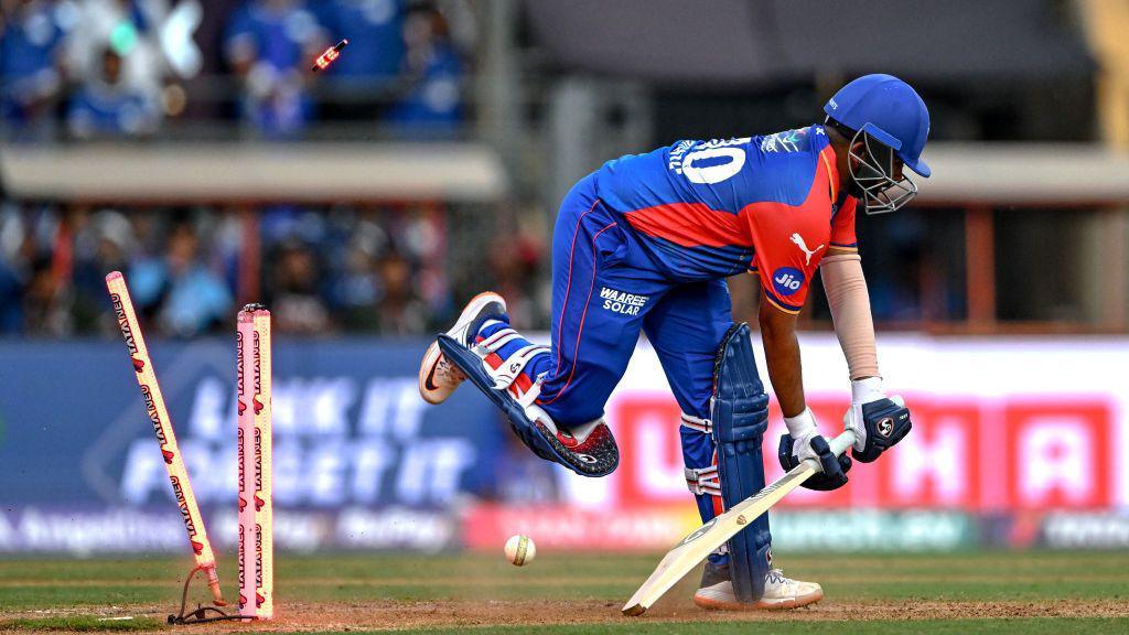 Delhi Capitals' Prithvi Shaw is clean bowled by Mumbai Indians' Jasprit Bumrah during the Indian Premier League (IPL) Twenty20 cricket match between Mumbai Indians and Delhi Capitals at the Wankhede Stadium in Mumbai on April 7, 2024.