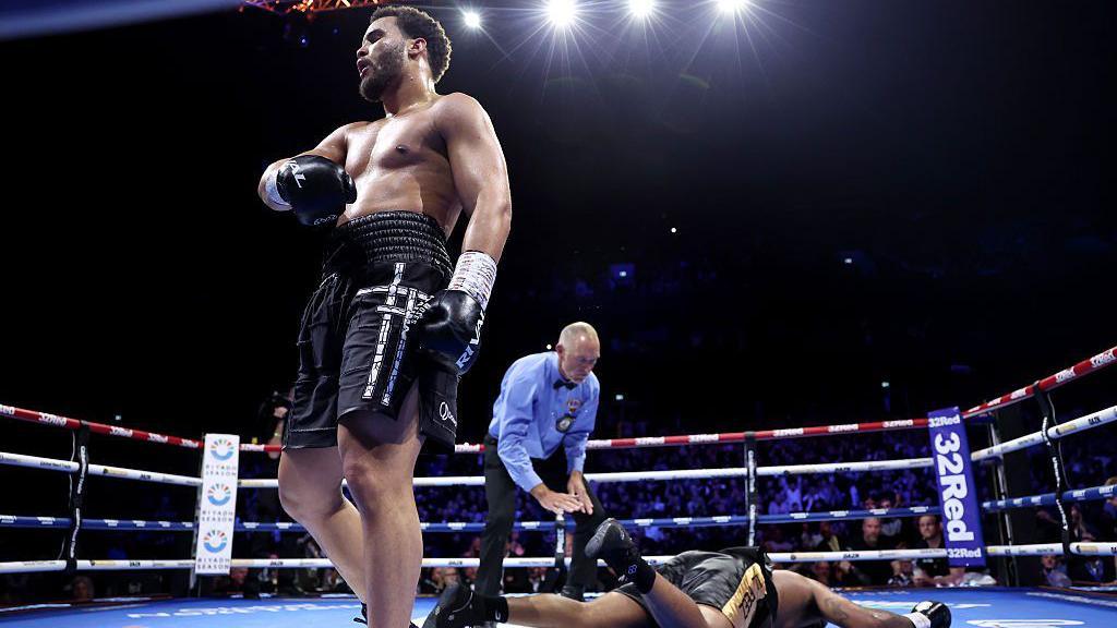 Moses Itauma celebrates as Jermaine Franklin is on the canvas