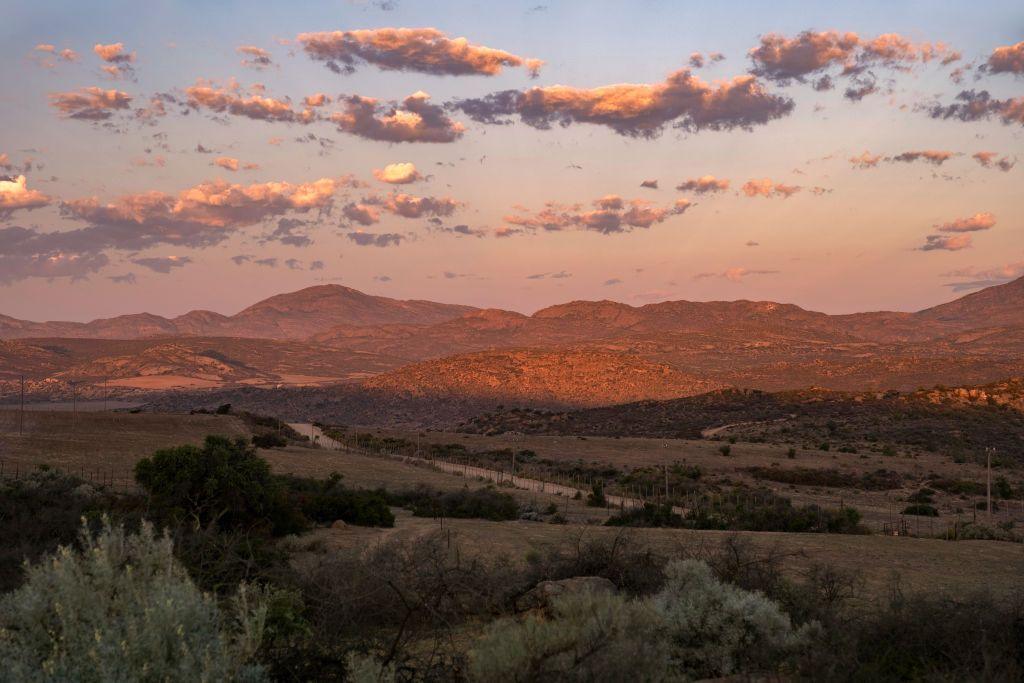 Sunset over semi-desert landscape in the Namaqua National Park, Namaqualand, Northern Cape province, South Africa