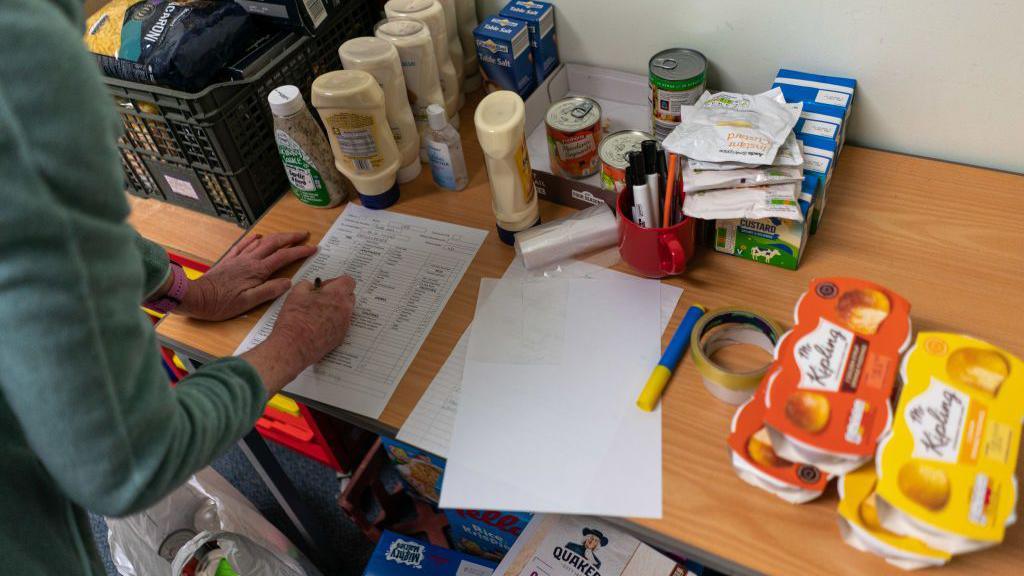 Volunteers are seen packing food parcels on March 02, 2022 in Edinburgh, Scotland