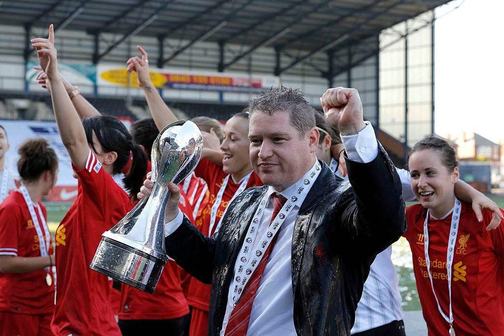 Matt Beard with the Women's Super League trophy