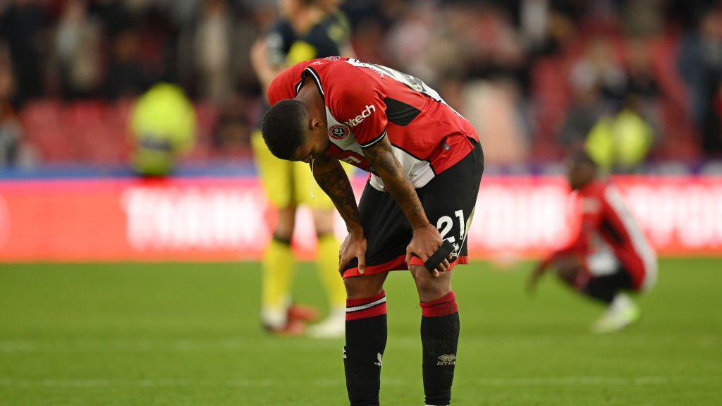 Vini Souza of Sheffield United looks dejected following the team's defeat during the Premier League match between Sheffield United and Newcastle United at Bramall Lane