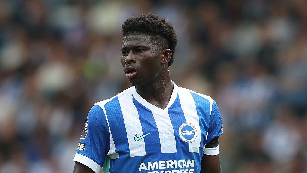 Carlos Baleba in action for Brighton against Fulham