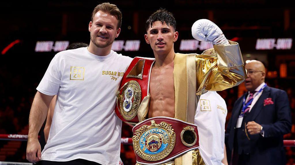 Ben Davison (left) and Royston Barney-Smith (right) pose for a photo after winning their fight