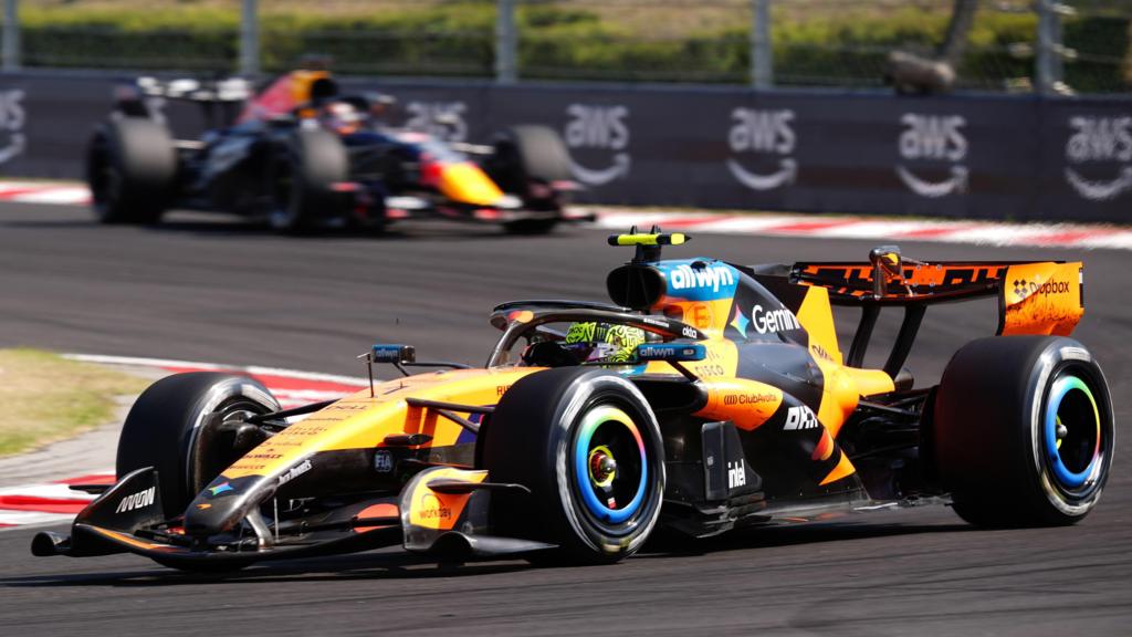 McLaren's Lando Norris with Max Verstappen in the background during the Hungarian Grand Prix