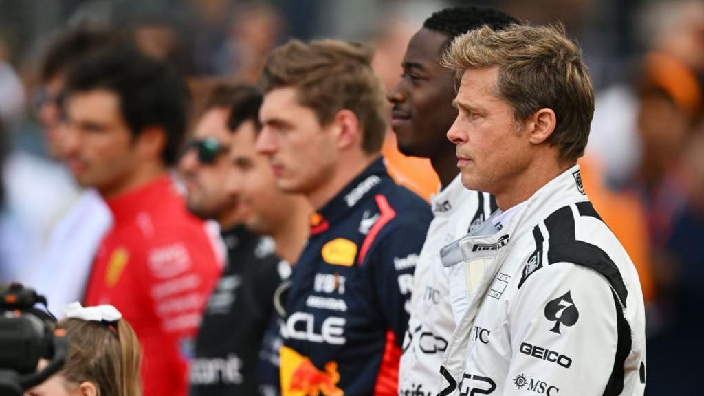 Brad Pitt and Damson Idris line up with F1 drivers Max Verstappen, Sergio Perez, Fernando Alonso and Carlos Sainz