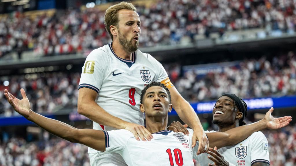 Harry Kane, Jude Bellingham and Noni Madueke celebrate for England