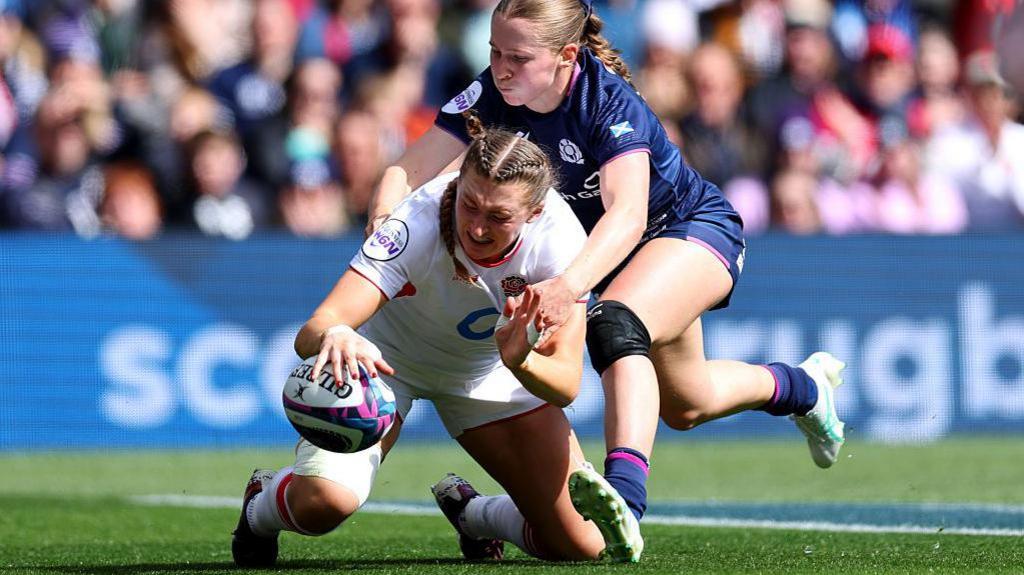 Emma Sing scores for England against Scotland