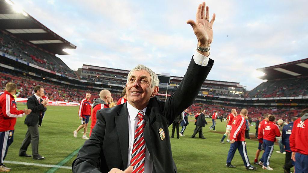 Sir Ian McGeechan waves to the fans