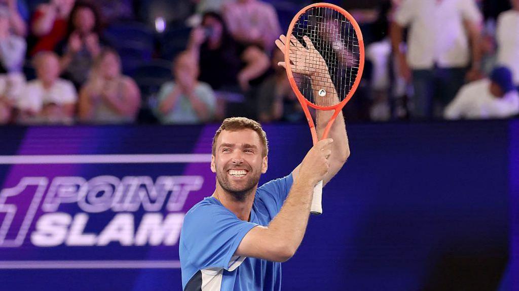 Jordan Smith celebrates winning the Million Dollar One Point Slam