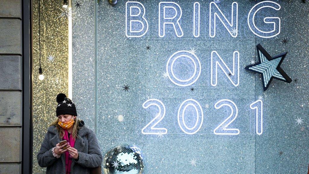 Woman outside shop