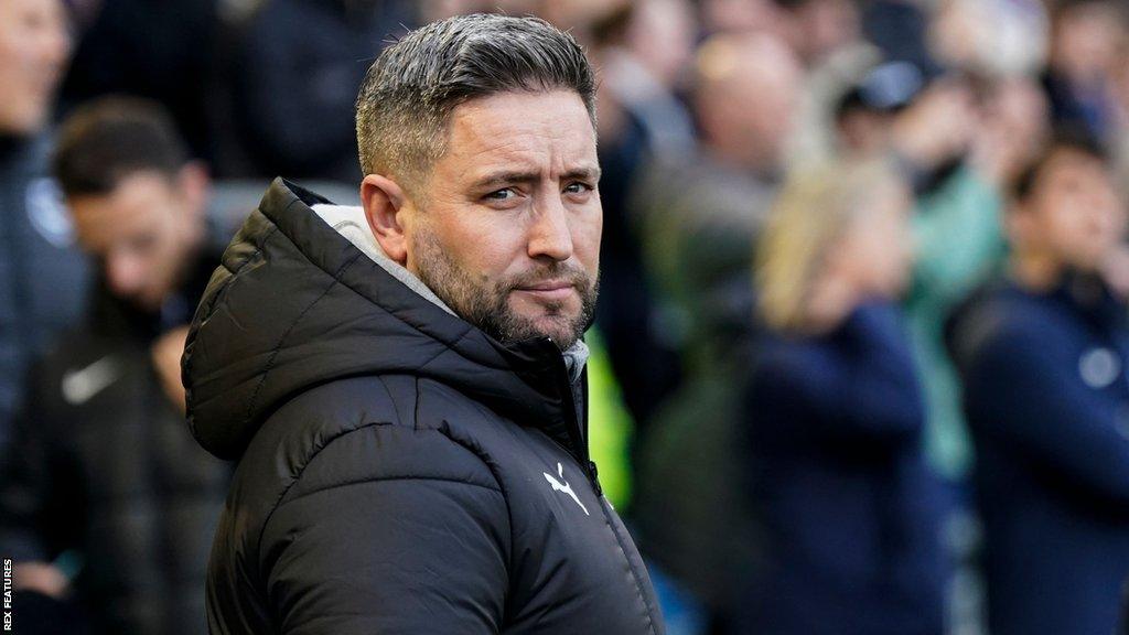 Fleetwood Town manager Lee Johnson at Fratton Park