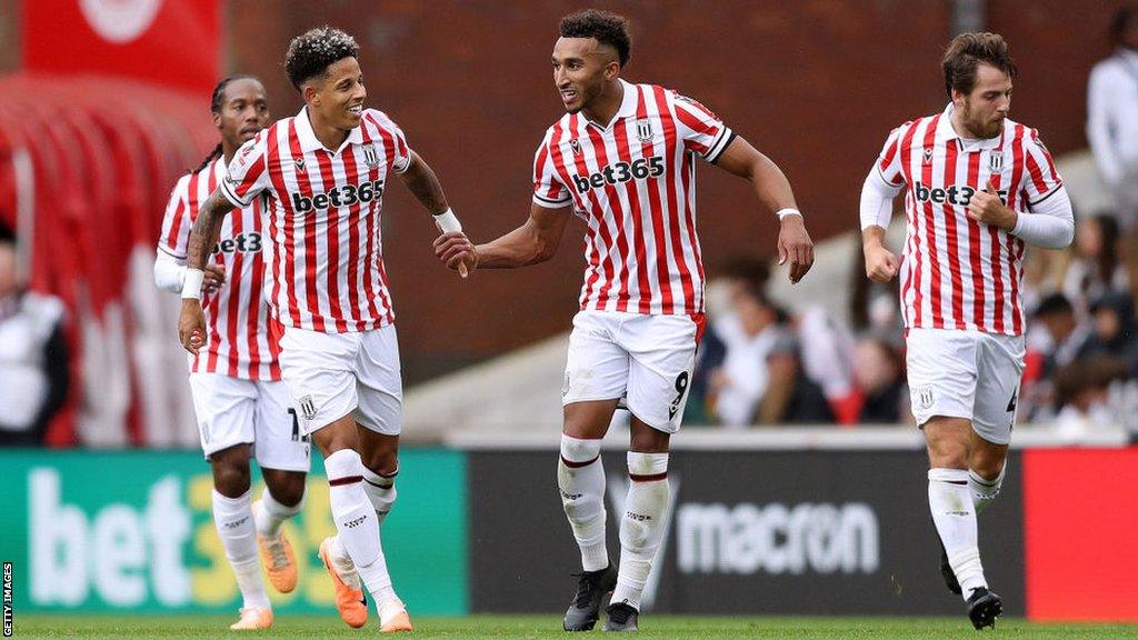 Jacob Brown celebrates with his team-mate after scoring for Stoke