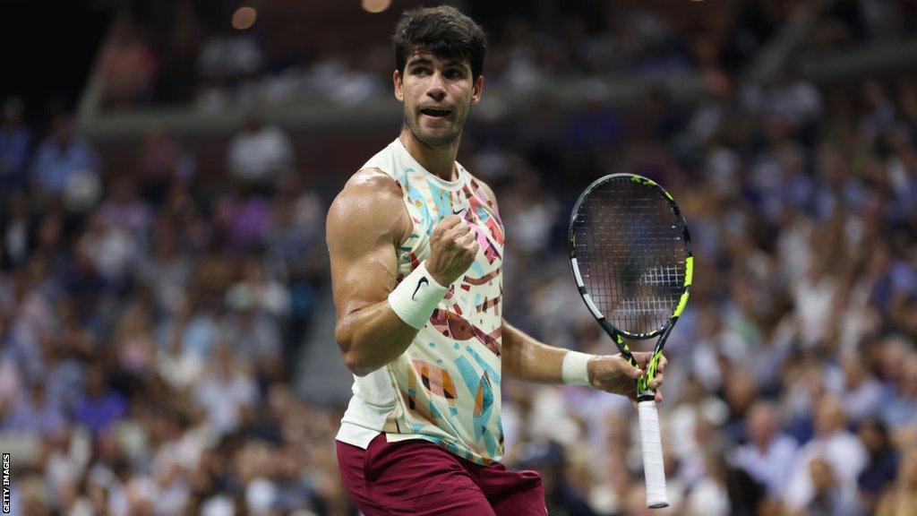 Carlos Alcaraz celebrates winning a point