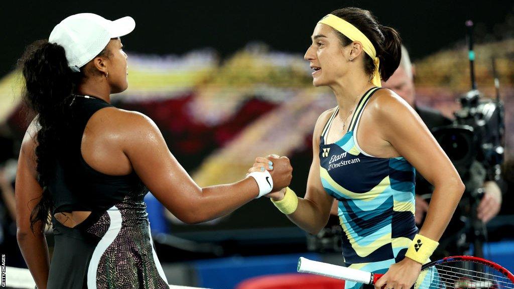 naomi osaka shakes hands with caroline garcia