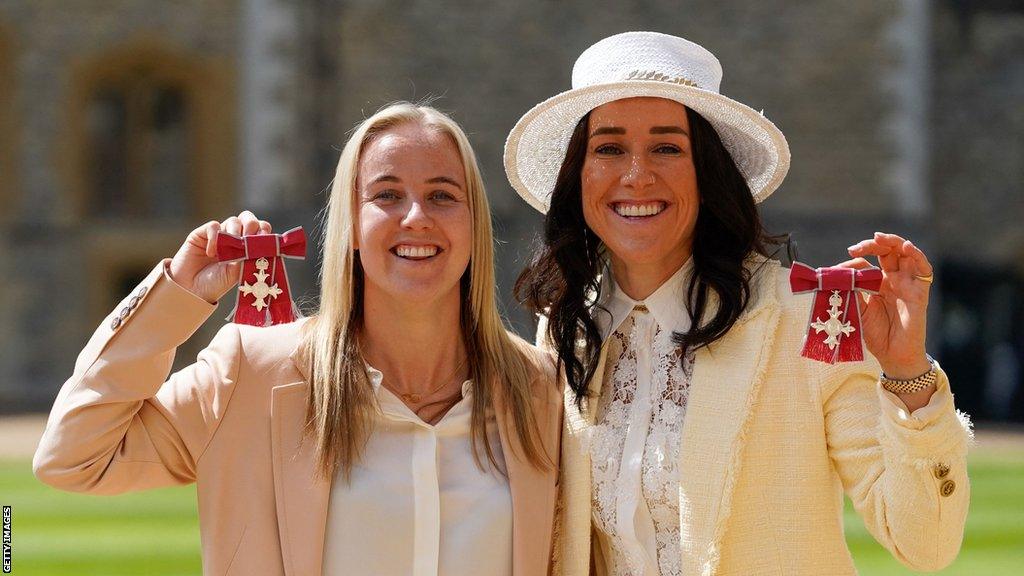 Beth Mead and Lucy Bronze pose with their OBE and MBE respectively